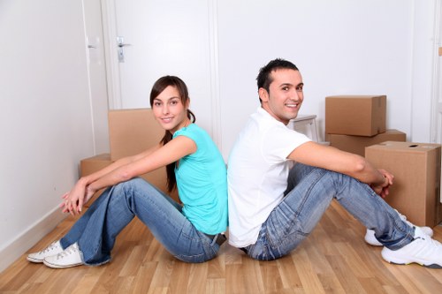 Professional movers arranging belongings for a home move in Lambeth